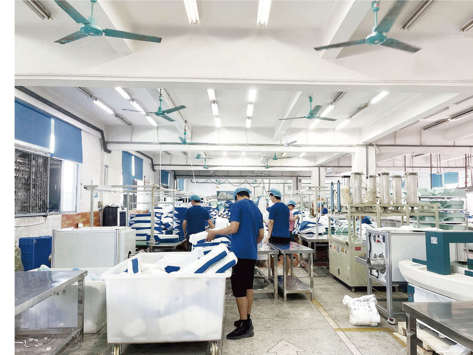 A wide view of pillow sample handling workstations
